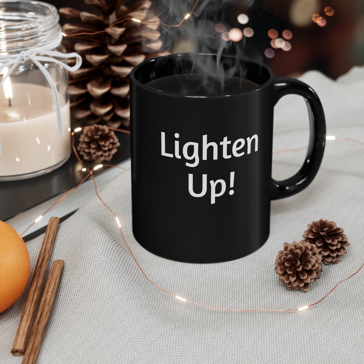 11oz Black ceramic mug with “Lighten Up!” printed on both sides.  Great all occasion gift for coffee and tea lovers