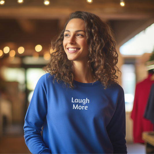 Sweatshirt for Men and women with “Laugh More”